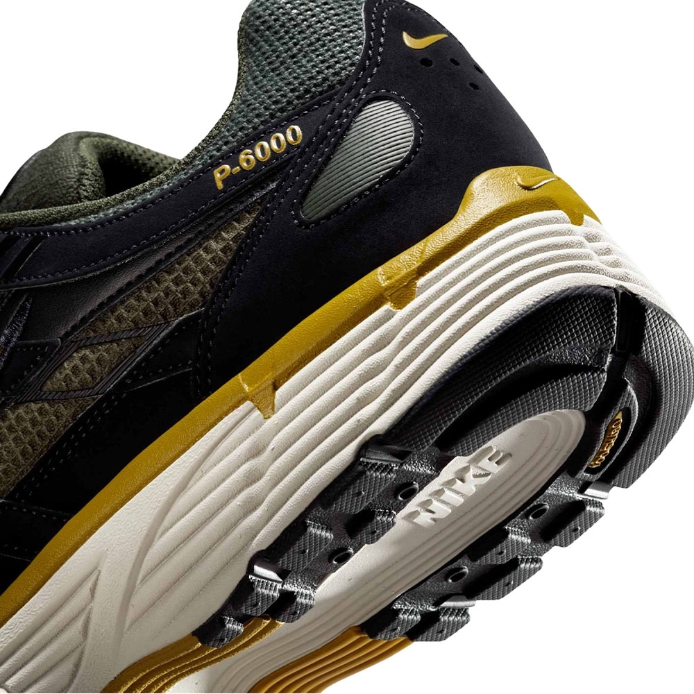 Tênis Nike P-6000 Preto/dourado